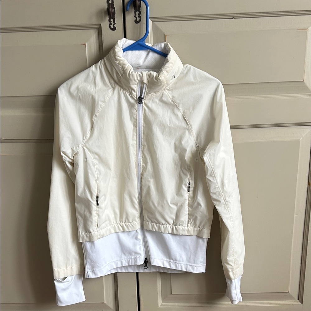 CALIA by Carrie Underwood Off-White reflective jacket.